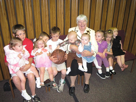 Gracia with 10 of her grandchildren